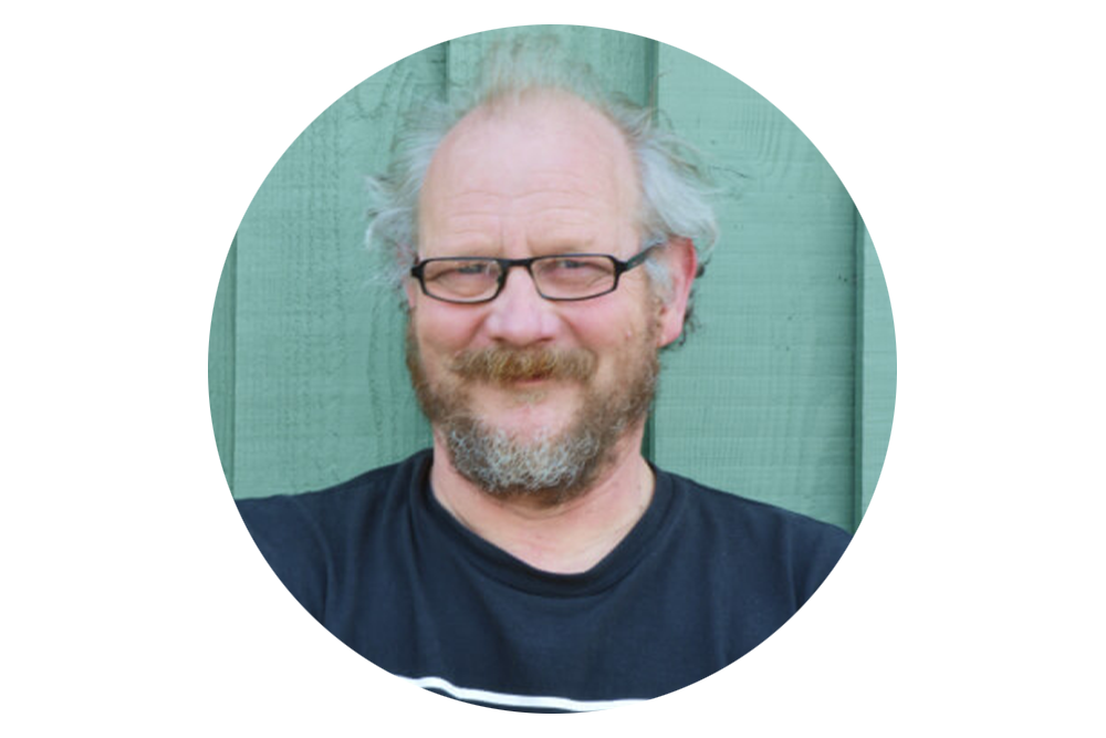 Image of Sean at Cyclexperience with a green background