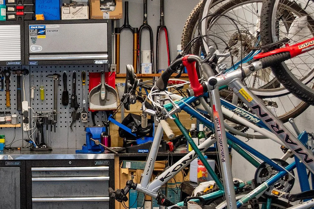 Bicycle repair workshop with tools and equipment
